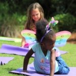 girl doing yoga outside