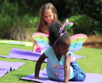 girl doing yoga outside